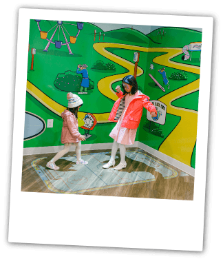 Two young girls playing in pediatric dental office