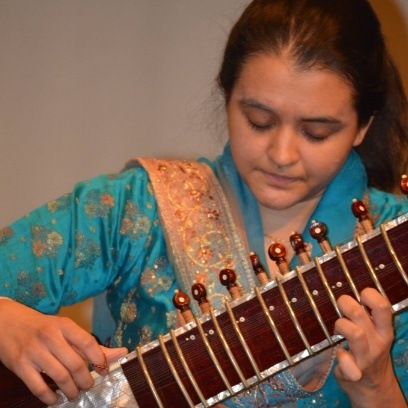 Doctor Takiar playing the sitar