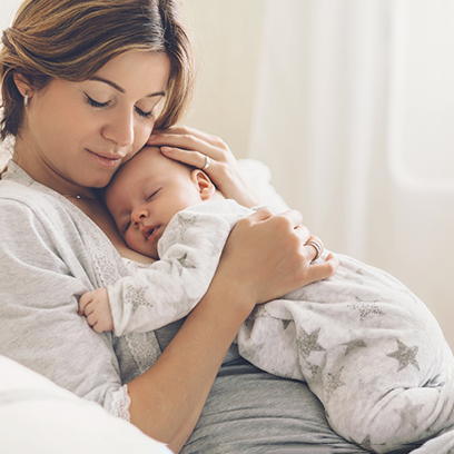 Woman holding an infant